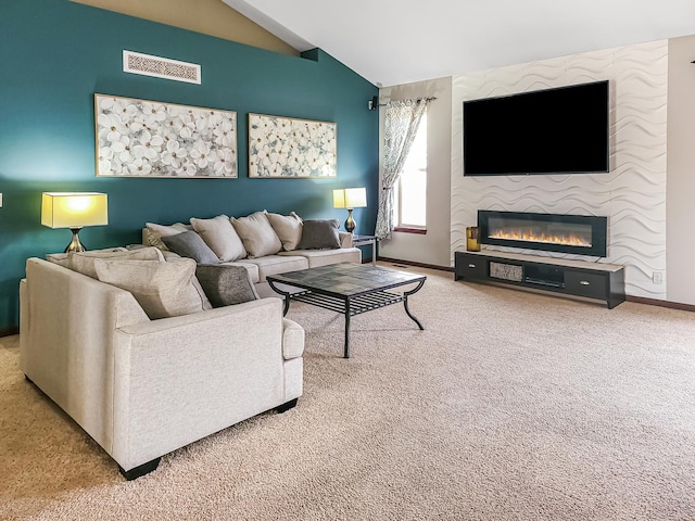 living room with lofted ceiling, carpet flooring, and a fireplace