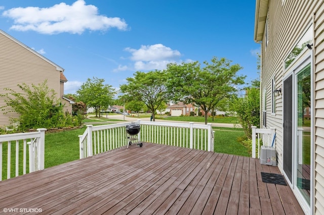 deck featuring a lawn