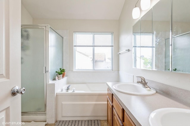 bathroom featuring tile patterned floors, vanity, and plus walk in shower