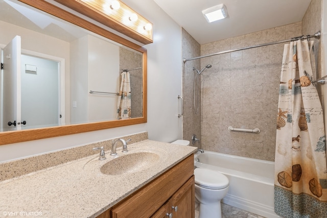 full bathroom featuring shower / bath combo with shower curtain, vanity, and toilet