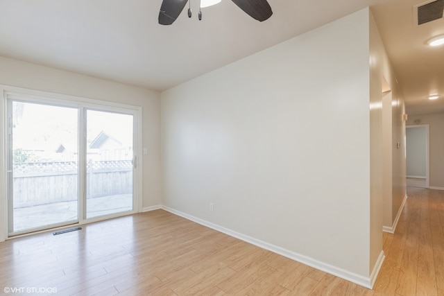 unfurnished room featuring ceiling fan and light hardwood / wood-style floors