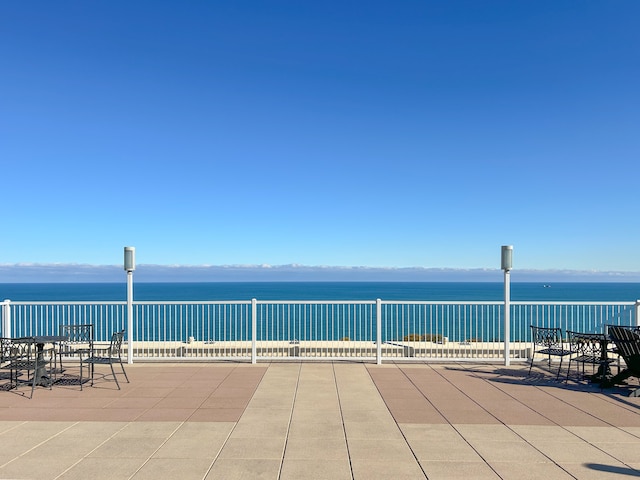 view of patio / terrace featuring a water view