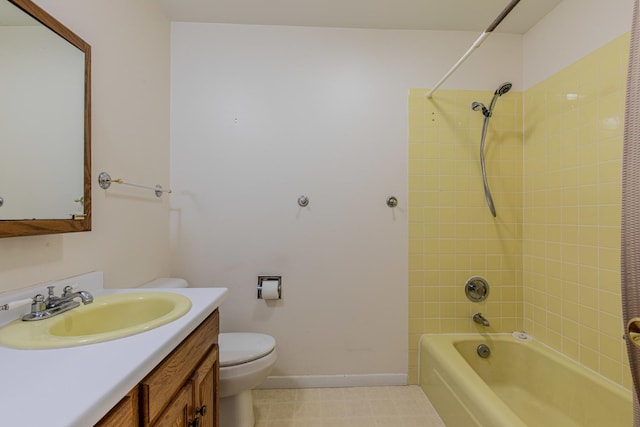 full bathroom featuring vanity, toilet, and tiled shower / bath