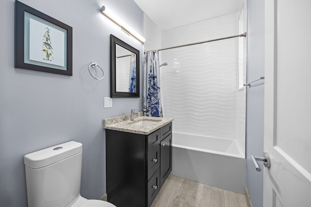 full bathroom with shower / bath combination with curtain, toilet, wood-type flooring, and vanity