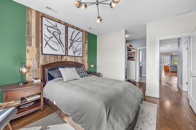 bedroom featuring hardwood / wood-style flooring and a closet