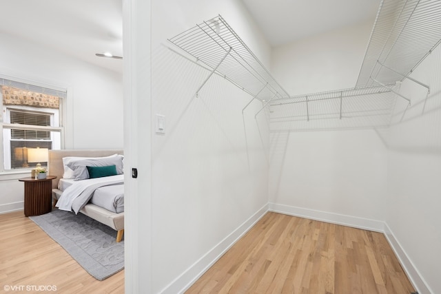 walk in closet featuring light wood-type flooring