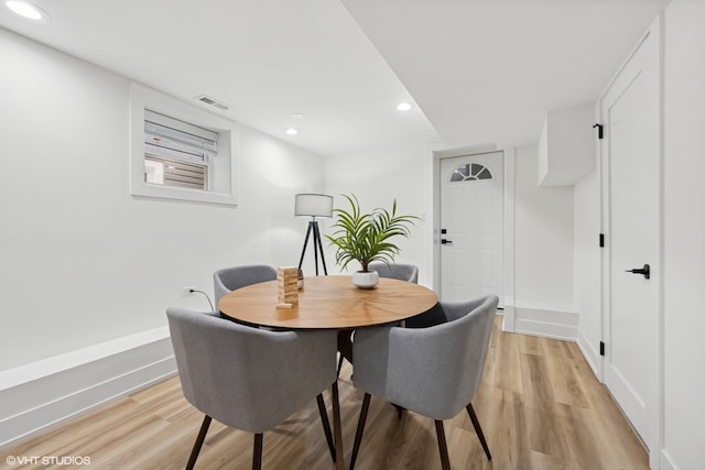 dining room featuring light hardwood / wood-style flooring