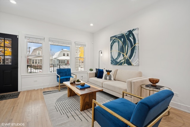 living room with light hardwood / wood-style floors