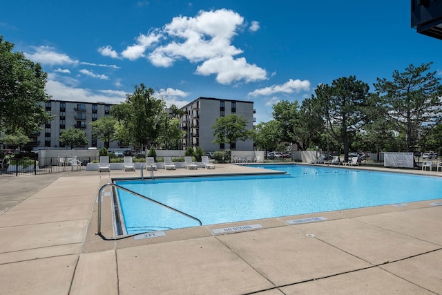 view of swimming pool featuring a patio