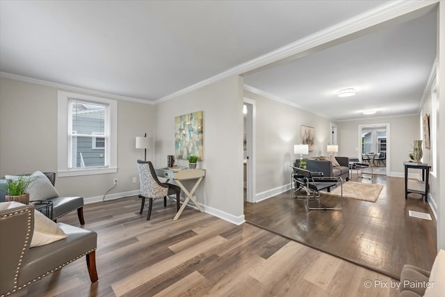 interior space with crown molding and hardwood / wood-style floors