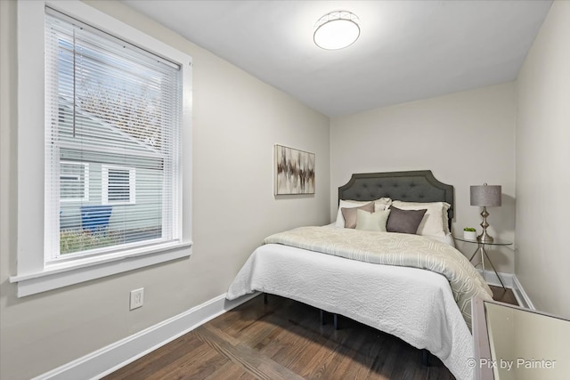 bedroom featuring dark wood-type flooring