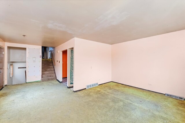 unfurnished room featuring carpet floors