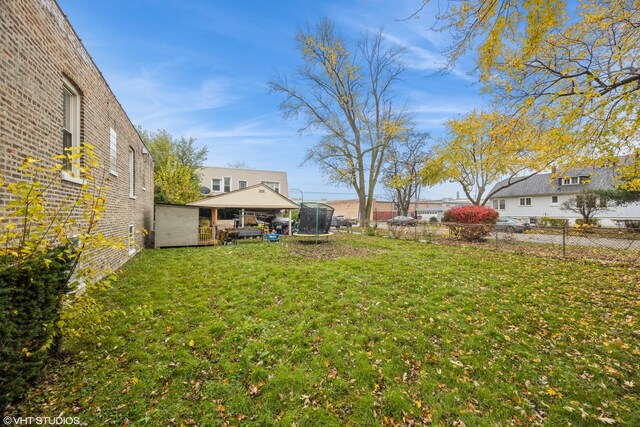 3235 S 50th Ct, Cicero, IL 60804 - view of yard featuring a trampoline