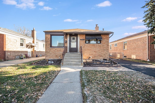 view of front of house with a front yard