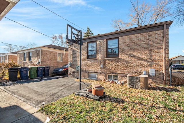 back of property with cooling unit