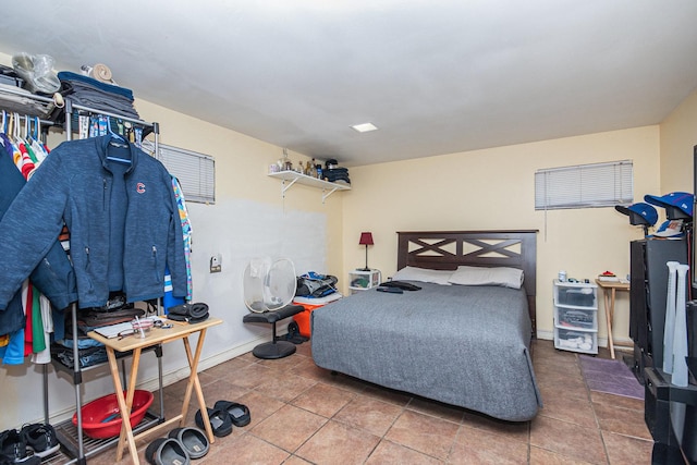 bedroom featuring tile patterned floors