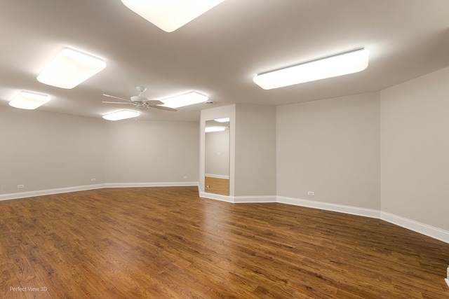 unfurnished room featuring ceiling fan and dark hardwood / wood-style flooring