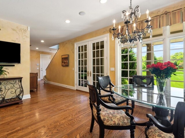 living area featuring recessed lighting, baseboards, wood finished floors, and french doors