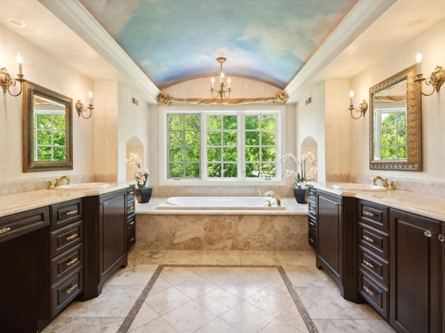 full bathroom featuring vaulted ceiling, plenty of natural light, and a sink