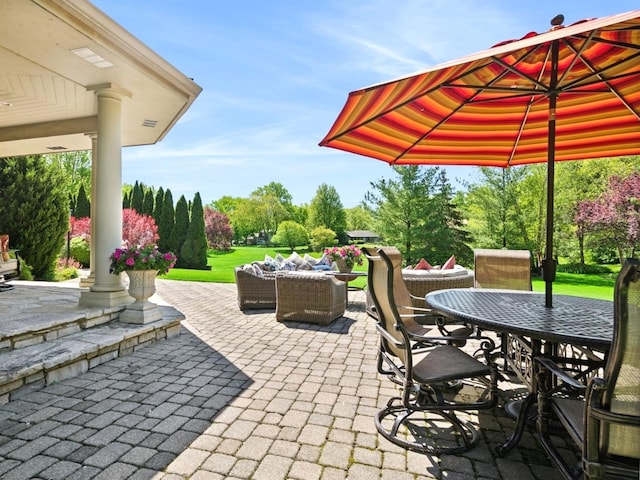 view of patio / terrace featuring an outdoor hangout area and outdoor dining space