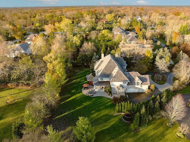 bird's eye view with a forest view