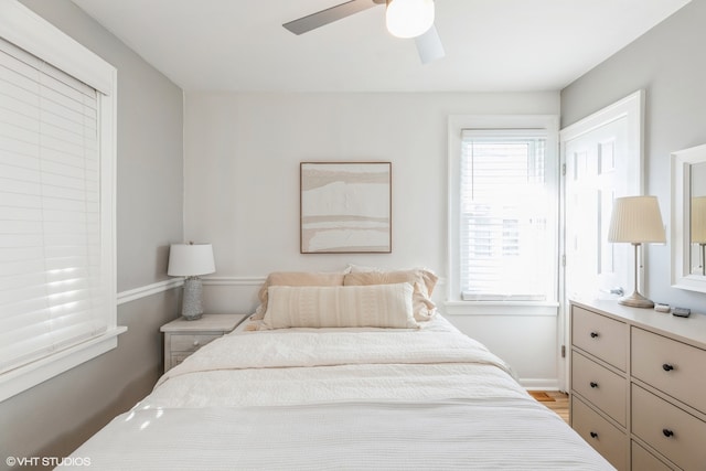 bedroom featuring ceiling fan and light wood-type flooring