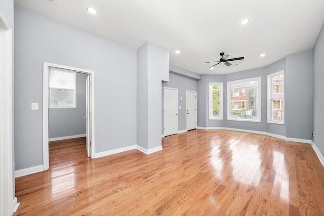 interior space featuring light hardwood / wood-style flooring and ceiling fan