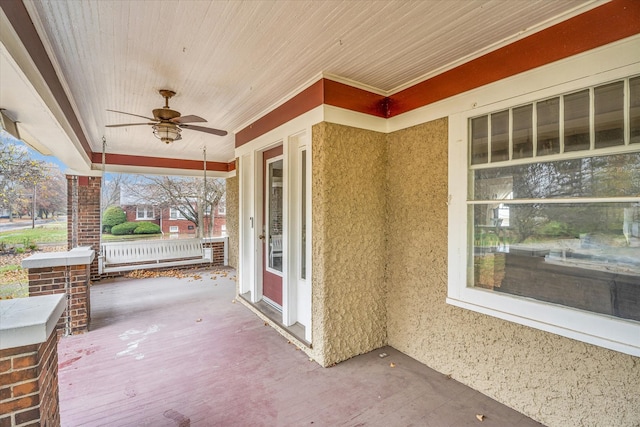 view of patio with a porch and ceiling fan