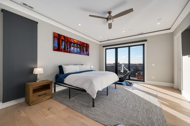 bedroom with ceiling fan, access to exterior, light wood-type flooring, and ornamental molding