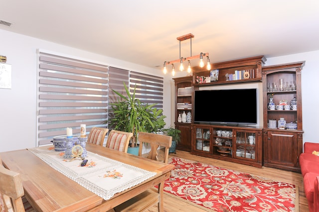 dining room with light wood-type flooring