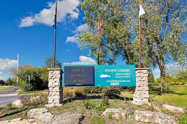 view of community sign