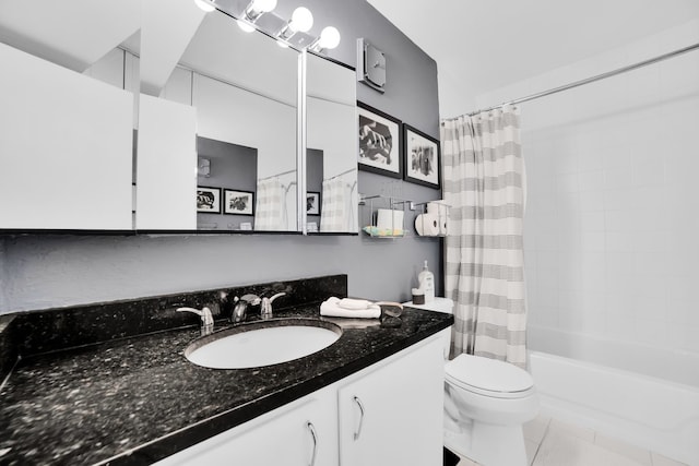 full bathroom featuring tile patterned flooring, vanity, toilet, and shower / bathtub combination with curtain