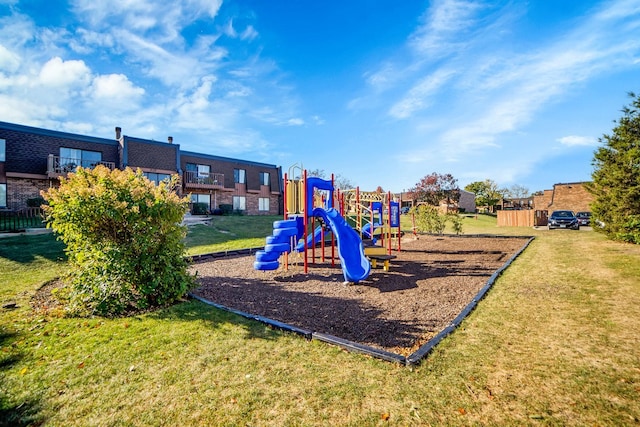 view of play area featuring a lawn