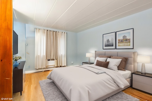 bedroom with light wood-type flooring