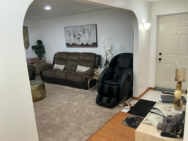 living room with light colored carpet