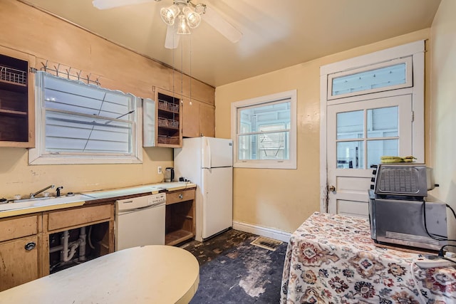 kitchen featuring ceiling fan, white appliances, and sink