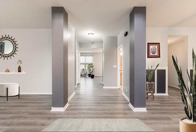 hallway featuring hardwood / wood-style flooring