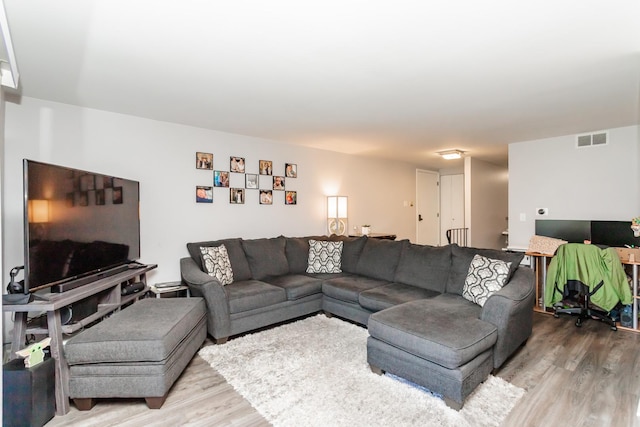 living room with hardwood / wood-style flooring