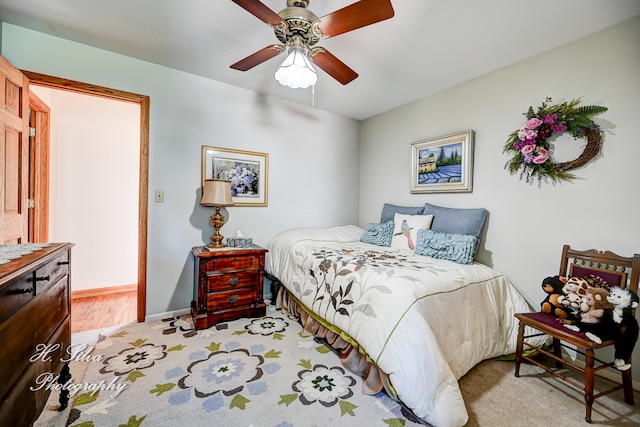 bedroom featuring ceiling fan and light wood-type flooring