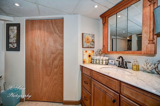 bathroom featuring tile patterned flooring and vanity