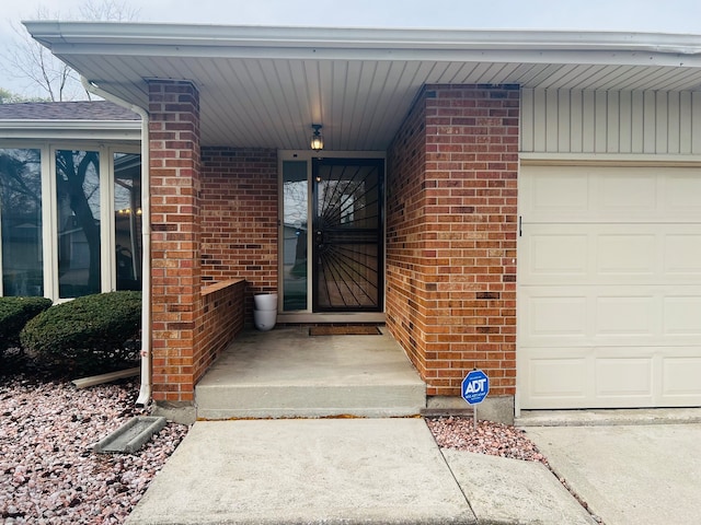 property entrance with a garage