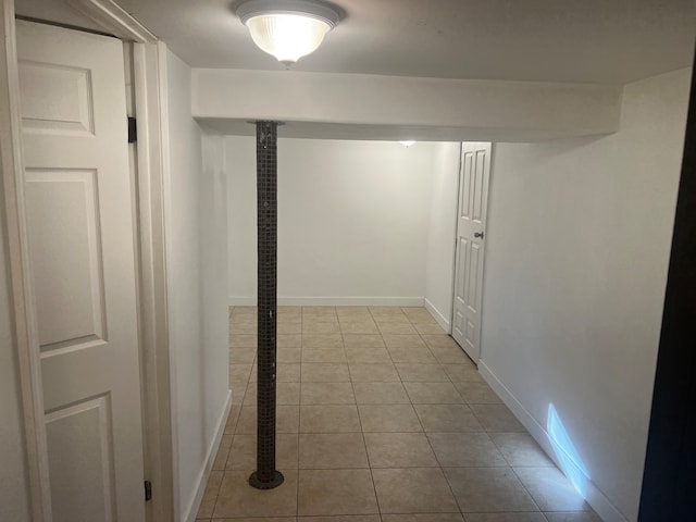 hallway with light tile patterned floors