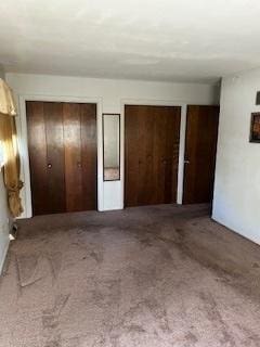 staircase with carpet floors