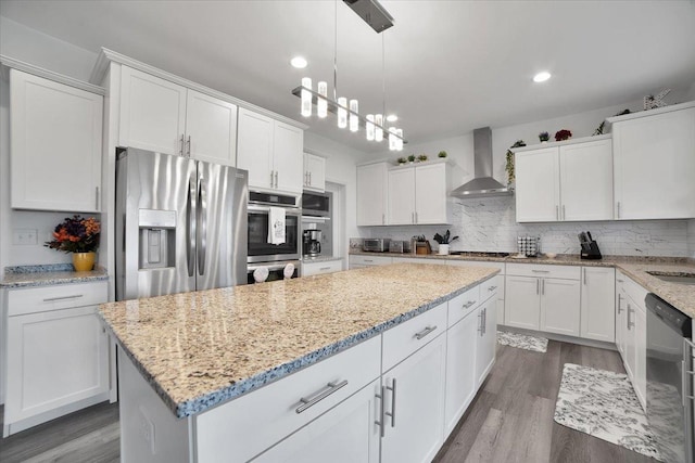 26864 W Wedgewood Ln, Channahon, IL 60410 - kitchen with wall chimney exhaust hood, stainless steel appliances, a kitchen island, dark wood-style floors, and recessed lighting