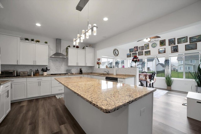 26864 W Wedgewood Ln, Channahon, IL 60410 - kitchen with wall chimney range hood, a sink, a center island, dishwasher, and tasteful backsplash