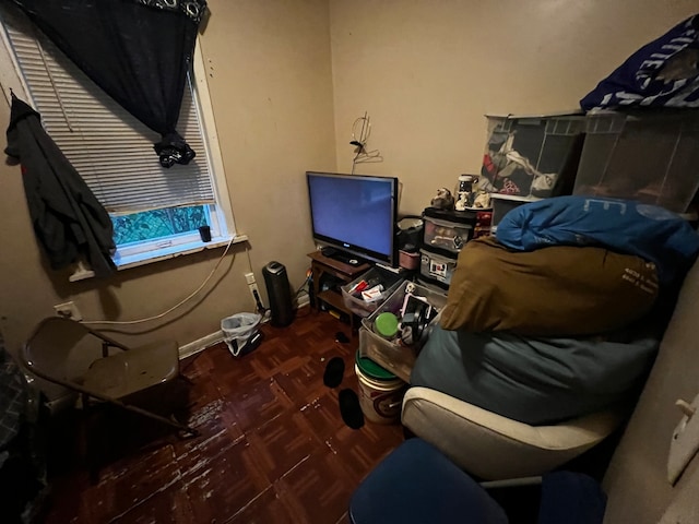 interior space featuring dark parquet floors