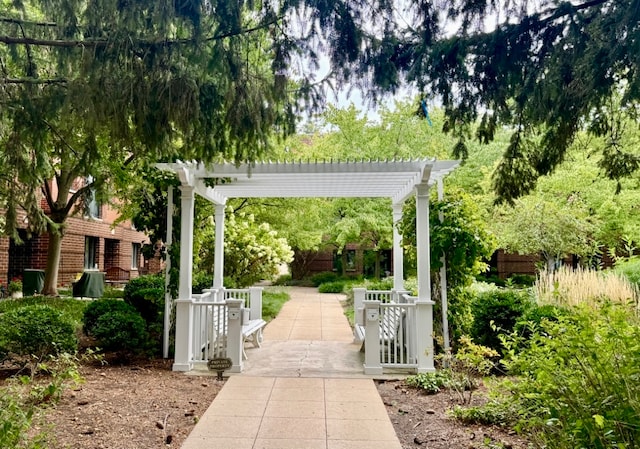 view of home's community with a pergola