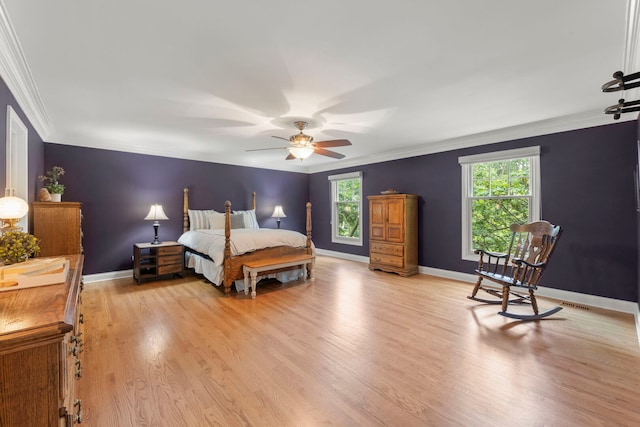 1310 Yorkshire Woods Ct, Wheaton, IL 60189 - bedroom featuring multiple windows, ornamental molding, light wood-style floors, and a ceiling fan