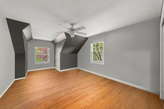 1310 Yorkshire Woods Ct, Wheaton, IL 60189 - additional living space with light wood-style flooring, a ceiling fan, and lofted ceiling