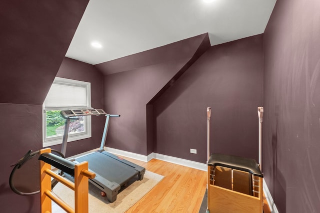 1310 Yorkshire Woods Ct, Wheaton, IL 60189 - workout room with wood finished floors, vaulted ceiling, and recessed lighting